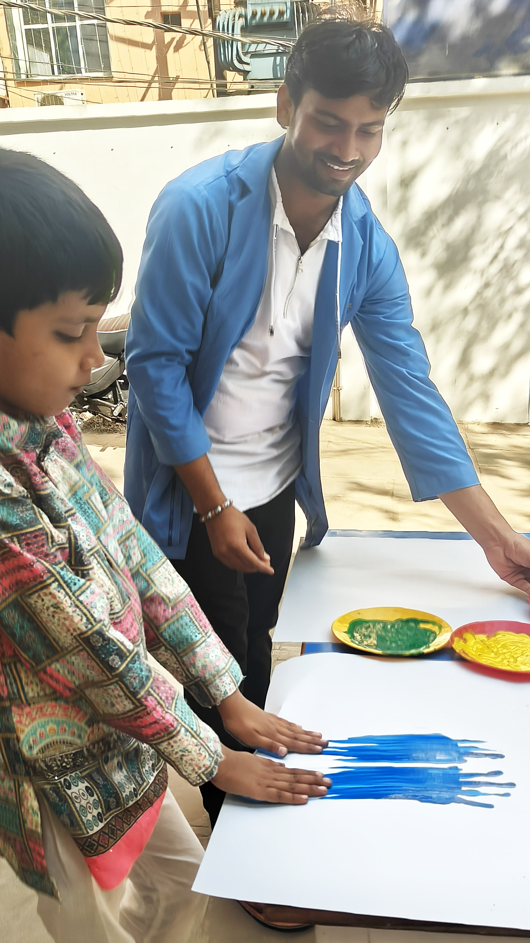 Special educator working with autistic child one-on-one